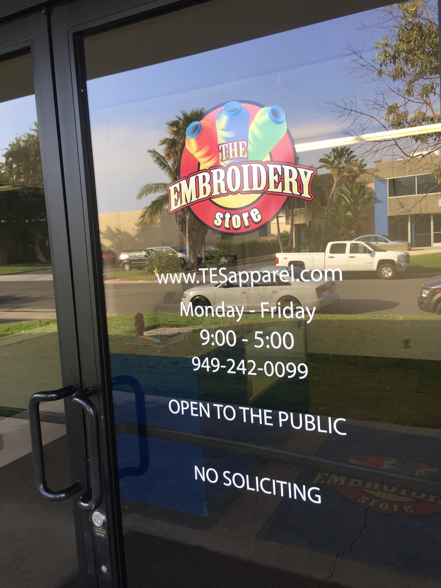Embroidery storefront window lettering